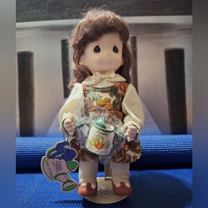 Precious Moments Brown-Haired Doll october